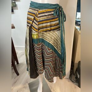 A COMMON THREAD size S wrap skirt. Fabric tag is missing assumed to be satin.EUC
